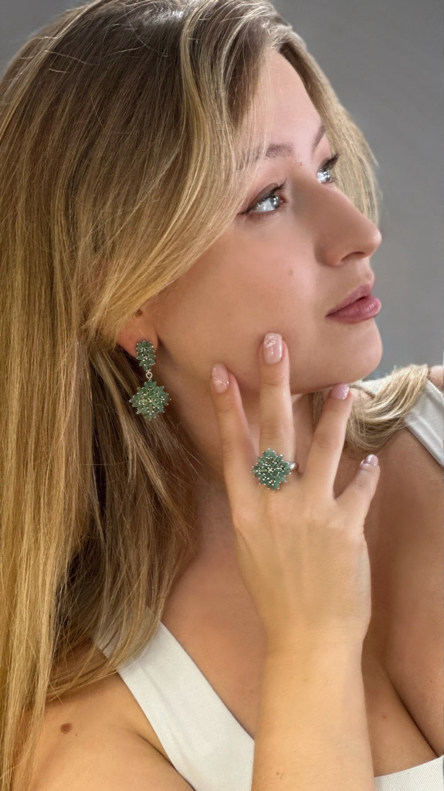 silver earrings with natural emeralds