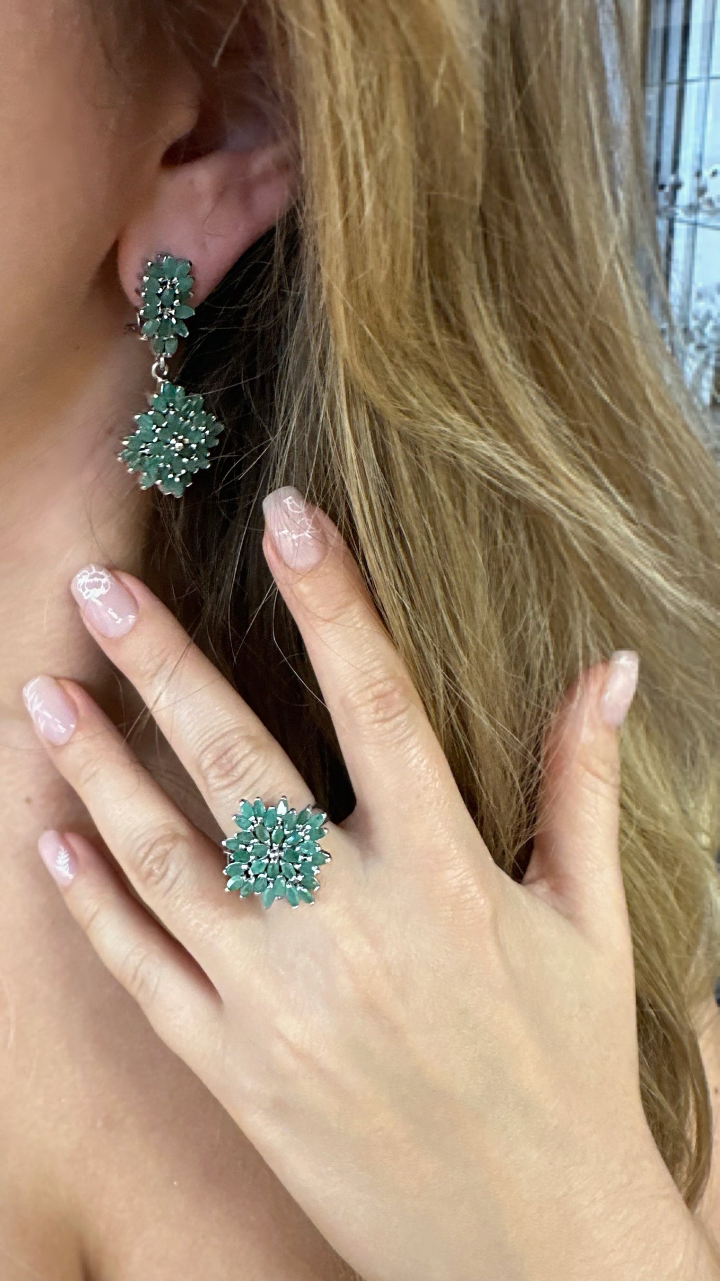 silver earrings with natural emeralds