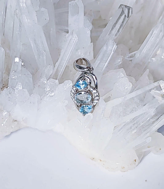 Silver Pendant with Aquamarine, Blue Topazes and Zircons