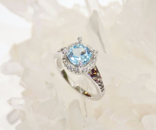 Silver Ring with Blue Topaz and Zircons