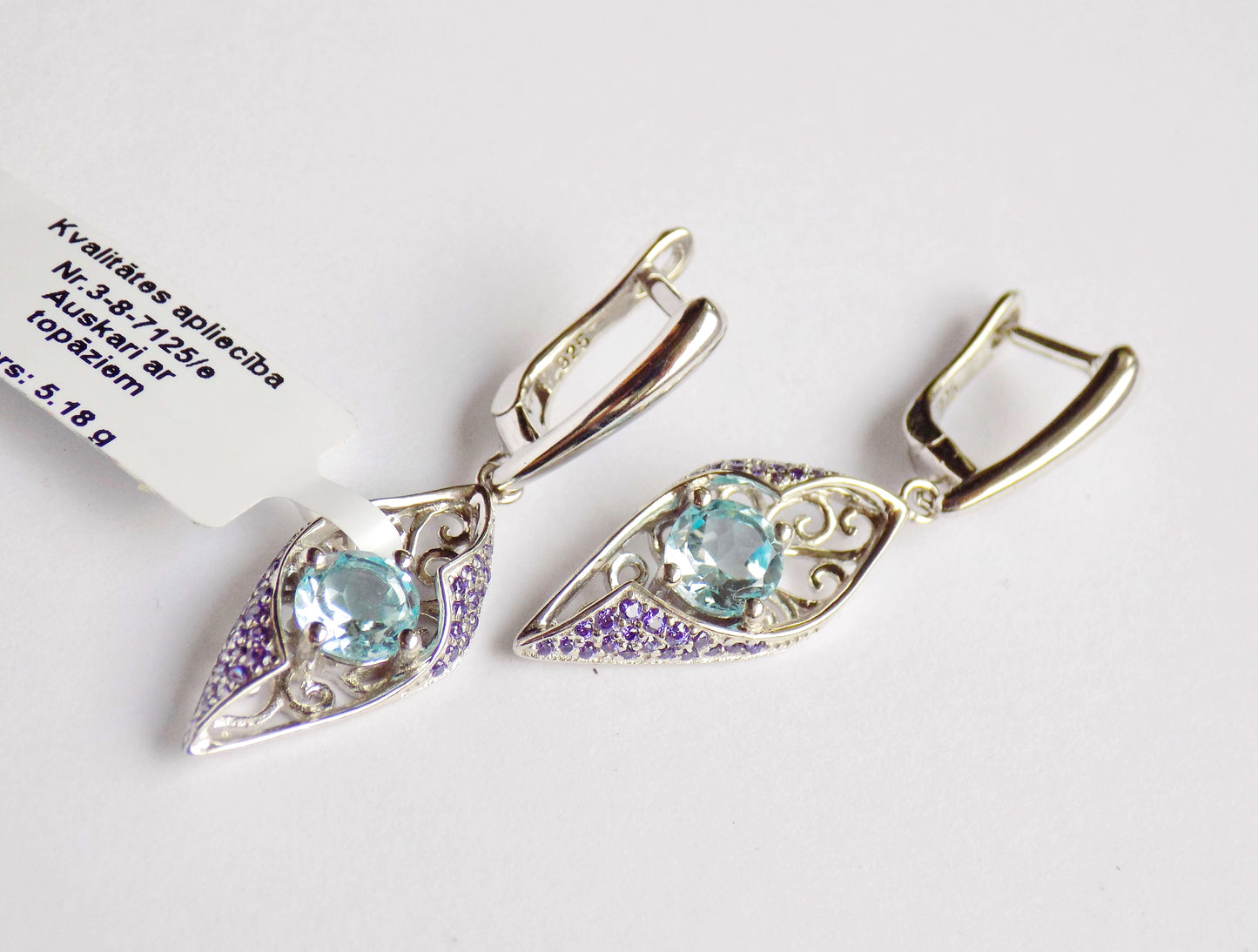 Silver Pendant with Blue Topaz and Purple Zircons