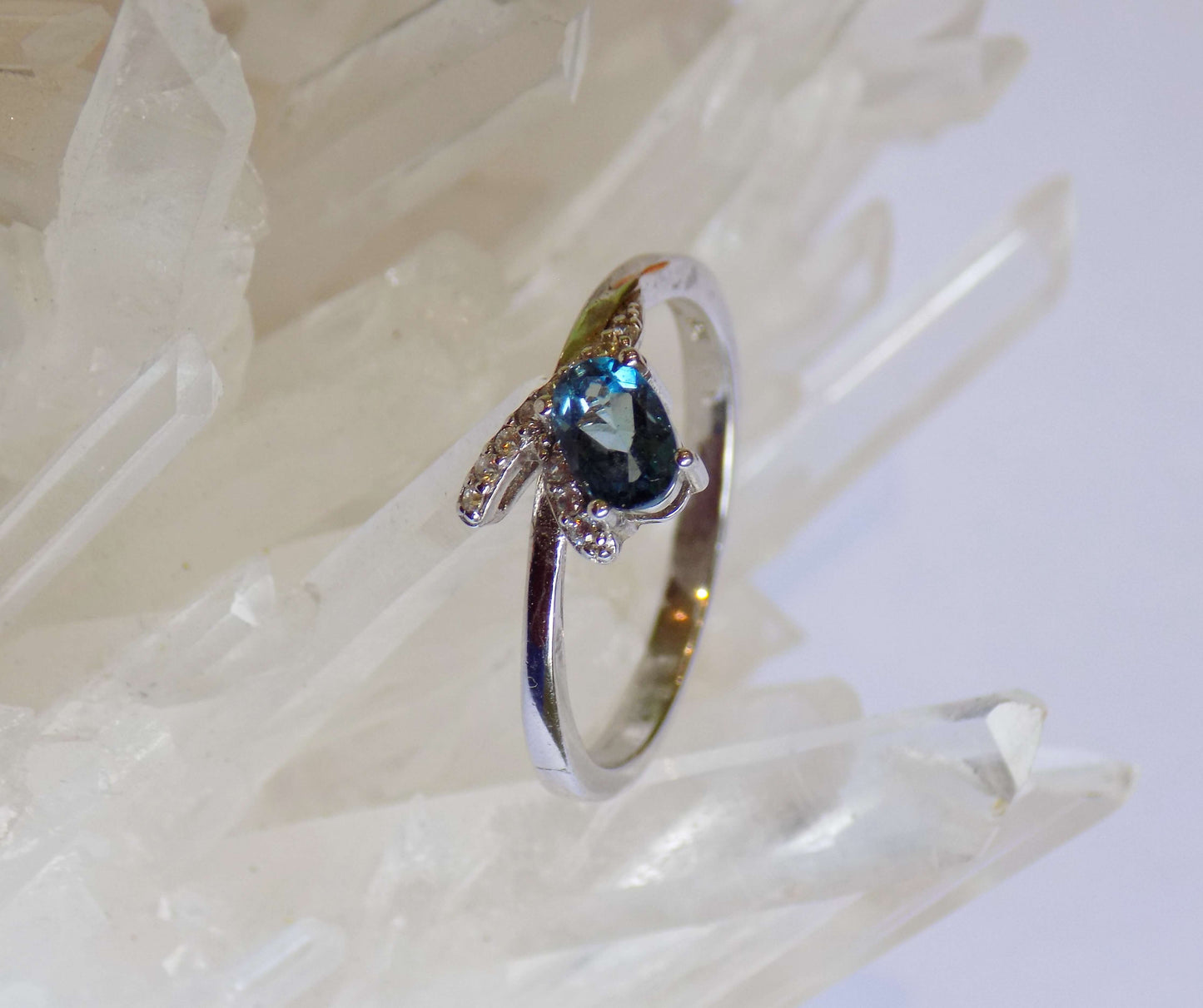 Silver Ring with London Blue Topaz and Zircons