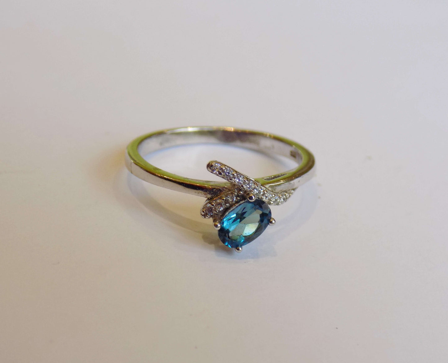 Silver Ring with London Blue Topaz and Zircons