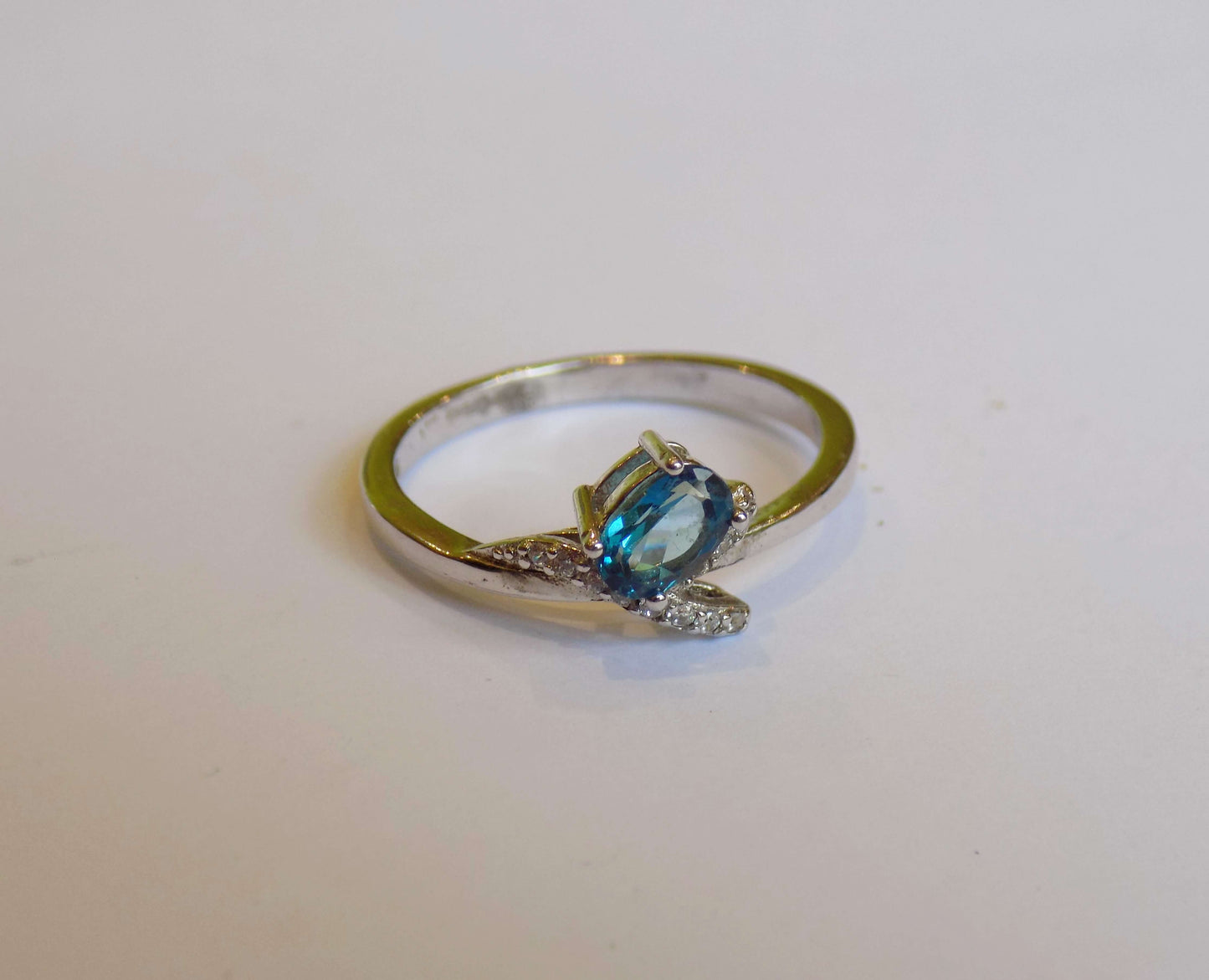 Silver Ring with London Blue Topaz and Zircons