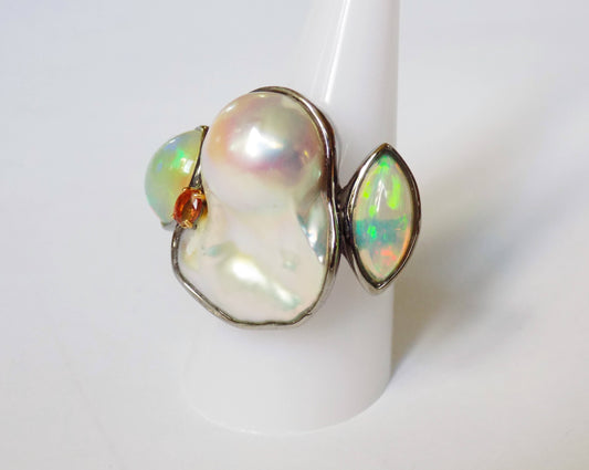 Silver Ring with White Baroque Sea Pearl, Opals and Orange Sapphire