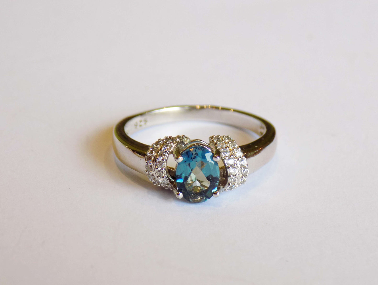 Silver Ring with London Blue Topaz and Zircons