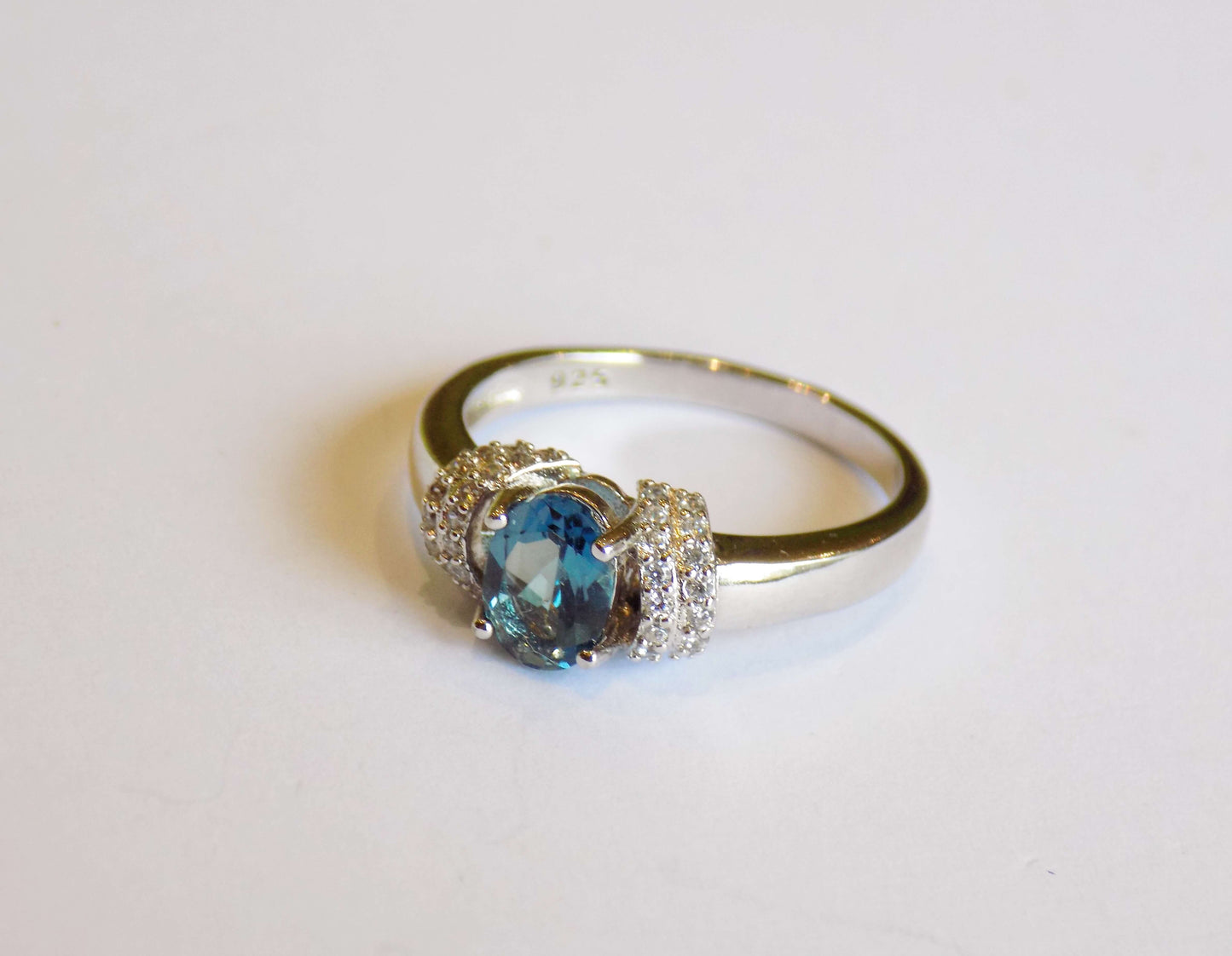 Silver Ring with London Blue Topaz and Zircons