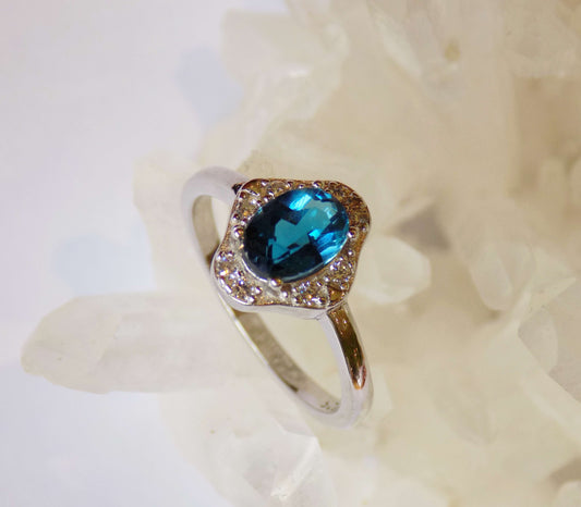 Silver Ring with London Blue Topaz and Zircons