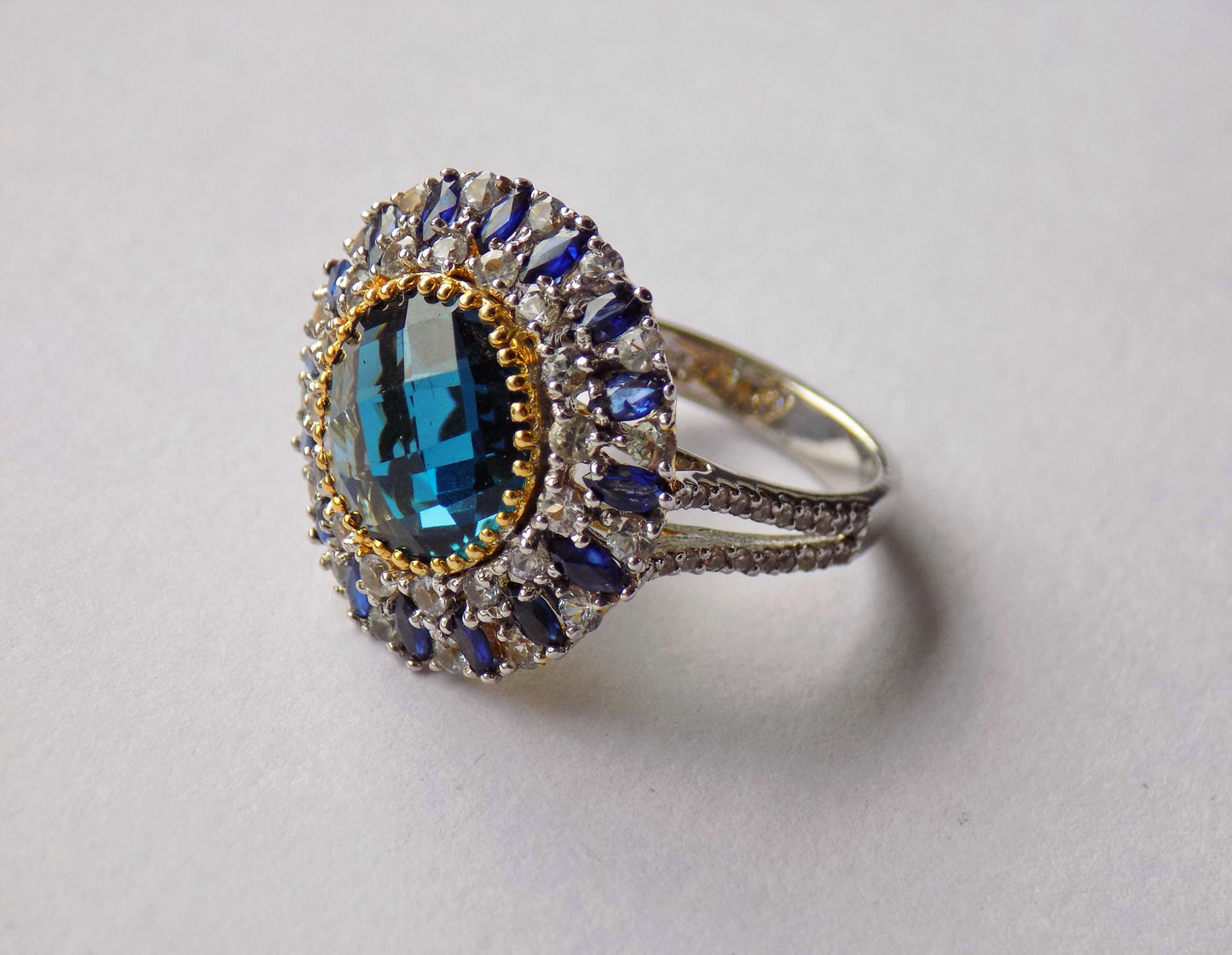 Silver Ring with London Topaz, Blue Sapphires and Leuco Sapphires