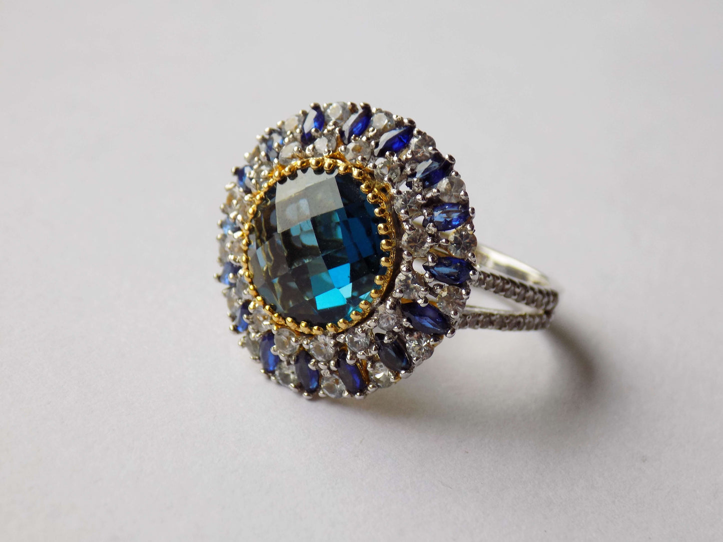 Silver Ring with London Topaz, Blue Sapphires and Leuco Sapphires