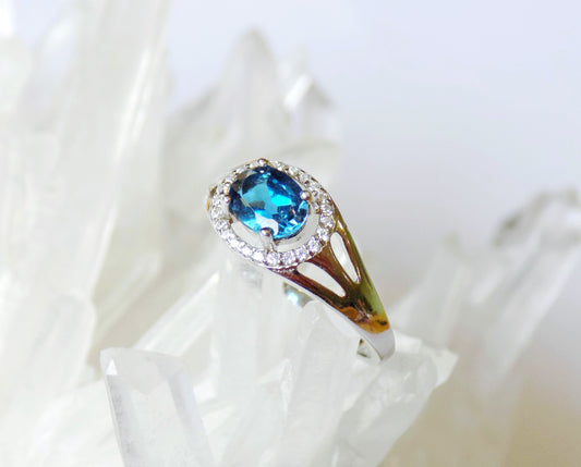 Silver Ring with London Blue Topaz and Zircons