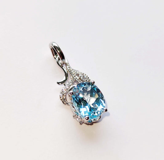 Silver Pendant with Blue Topaz and Zircons