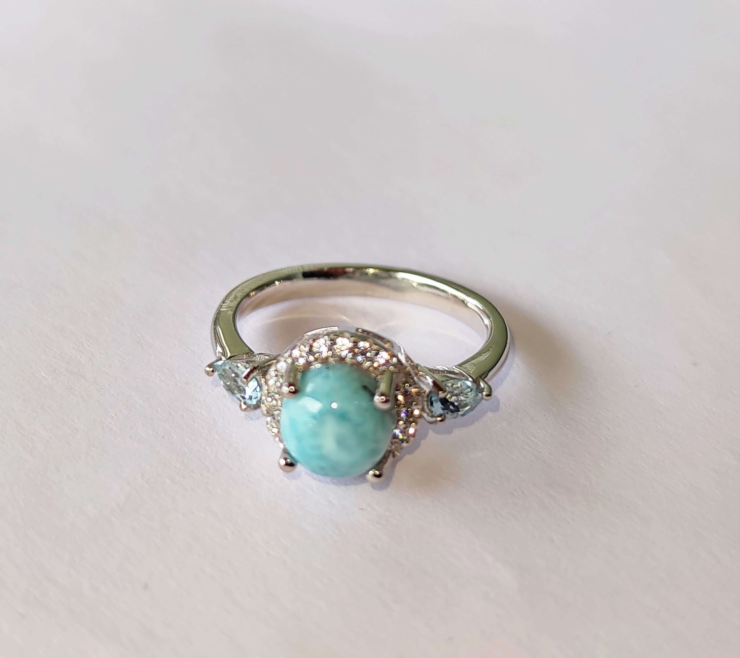 Silver Ring with Larimar, Blue Topazes and Zircons