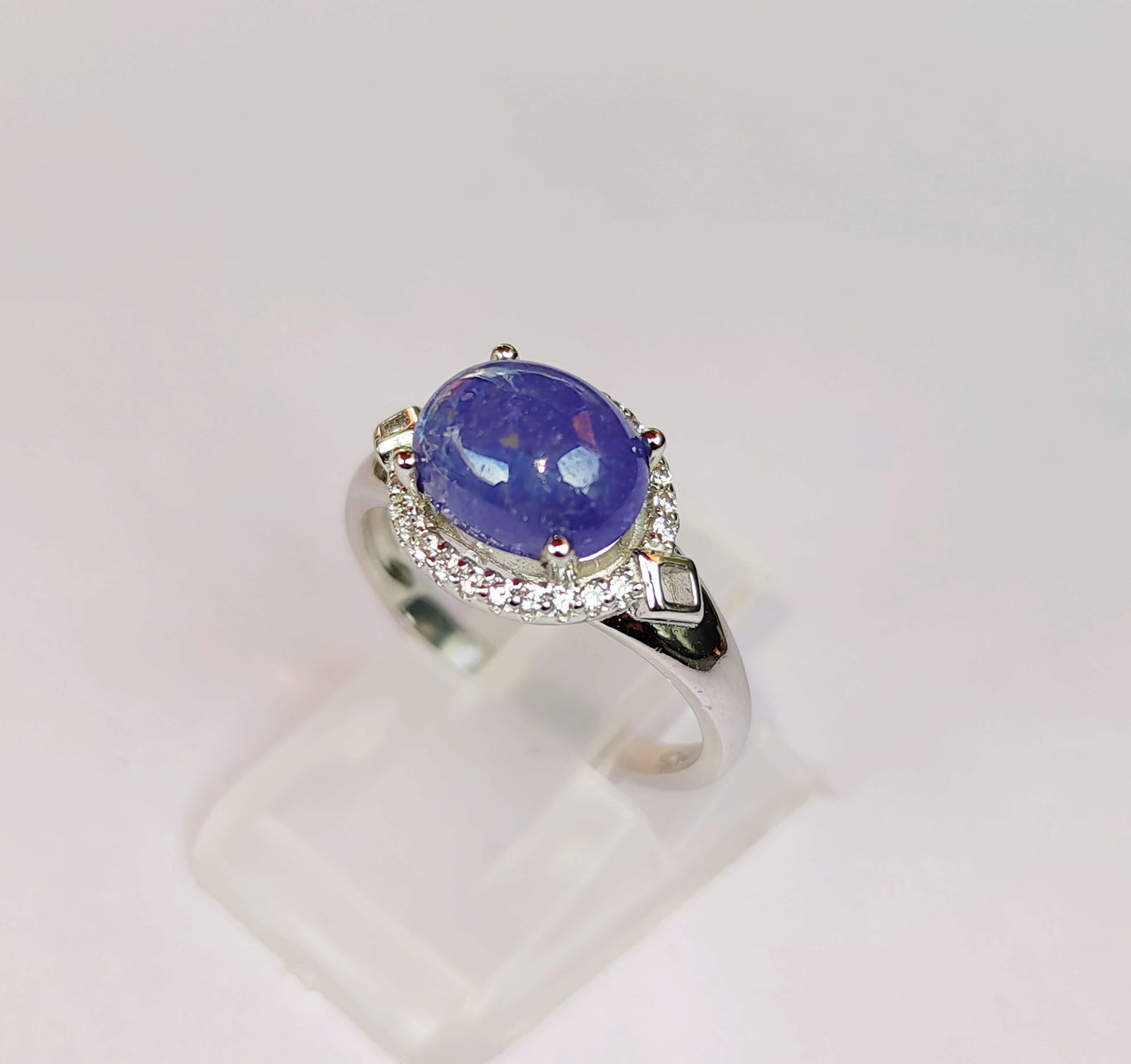 Silver Ring with Tanzanite and Zircons