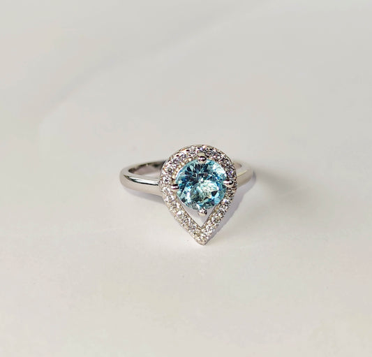 Silver Ring with Blue Topaz and Zircons