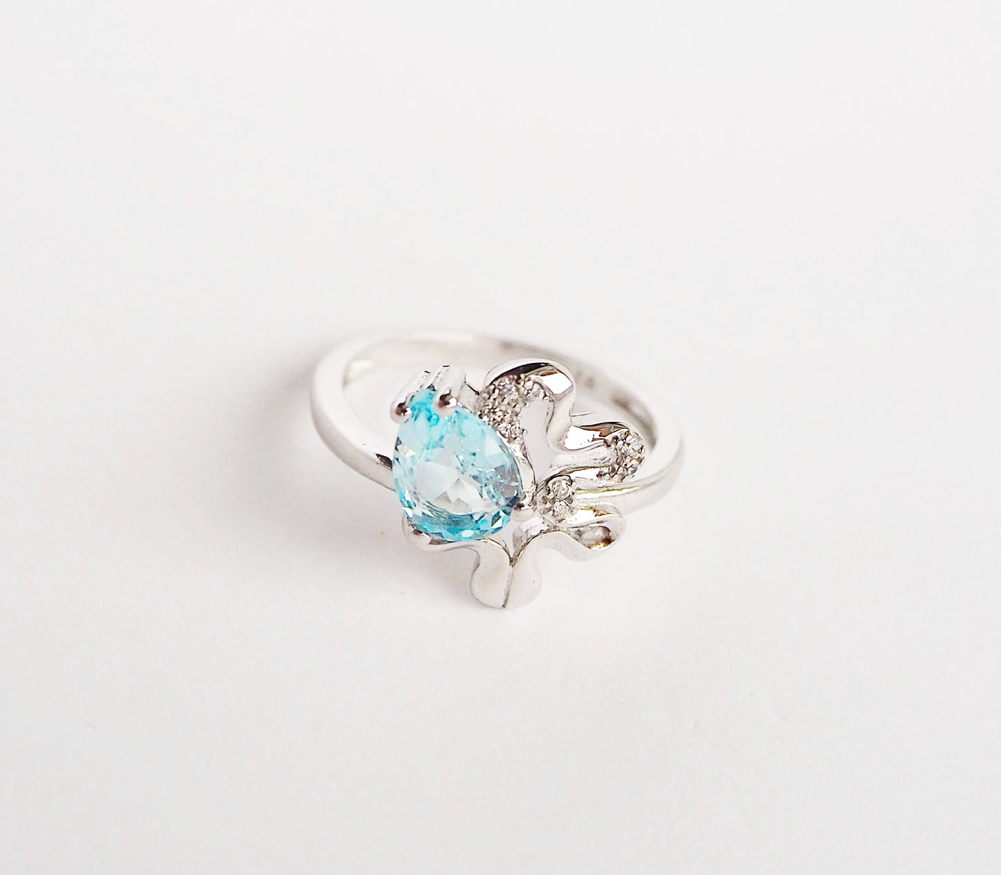 Silver Ring with Blue Topaz and Zircons