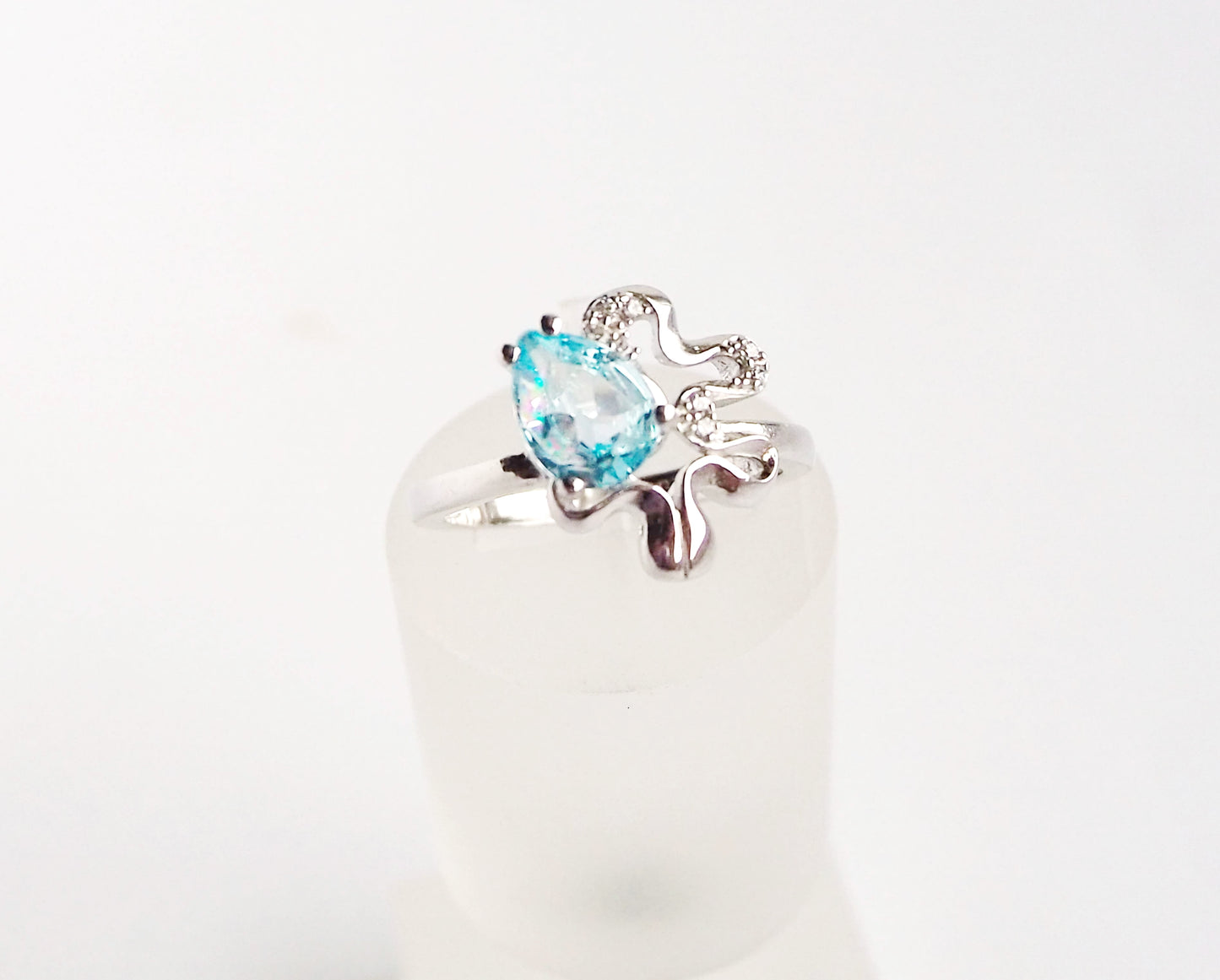 Silver Ring with Blue Topaz and Zircons