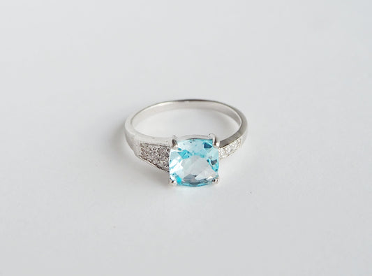 Silver Ring with Blue Topaz and Zircons