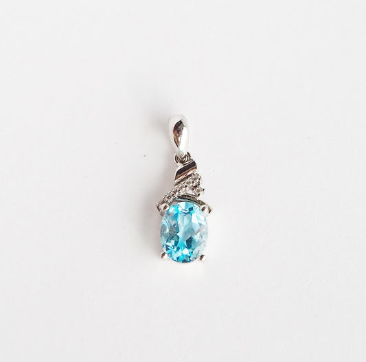 Silver Pendant with Blue Topaz and Zircons