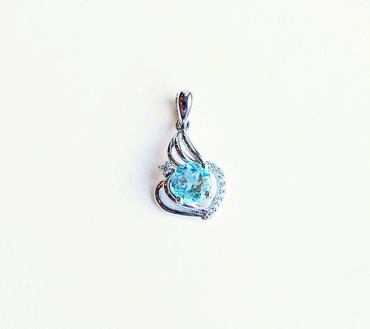 Silver Pendant with Blue Topaz and Zircons