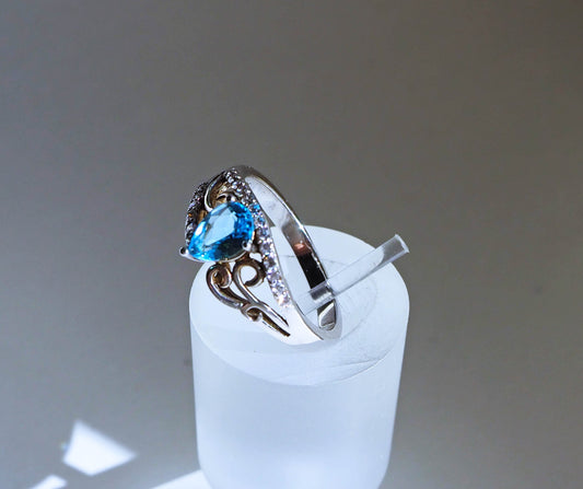 Silver Ring with Blue Topaz and Zircons